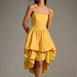Yellow strapless bubble hem corset party dress